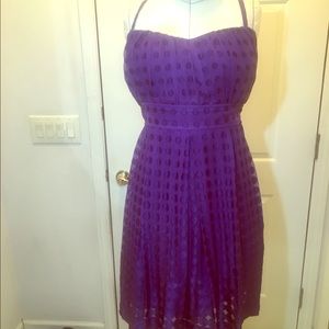Fun & flirty purple polka dot dress w/ back  sash