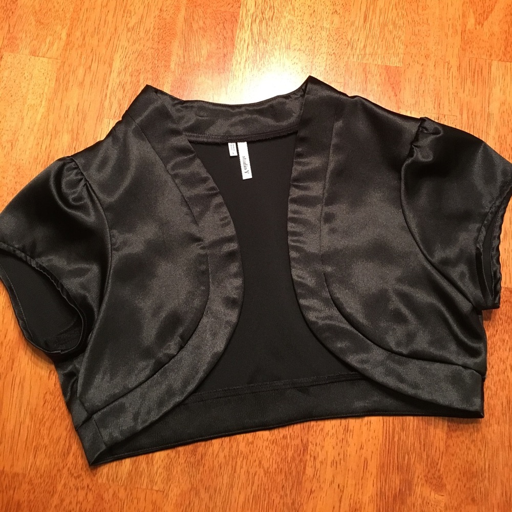 Studio Y shrug