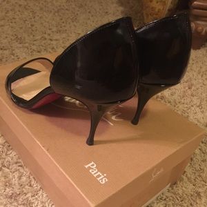 Christian Louboutin open toe patent pump.
