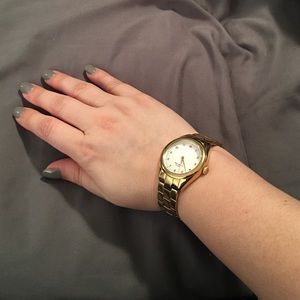 Kate Spade gold watch.
