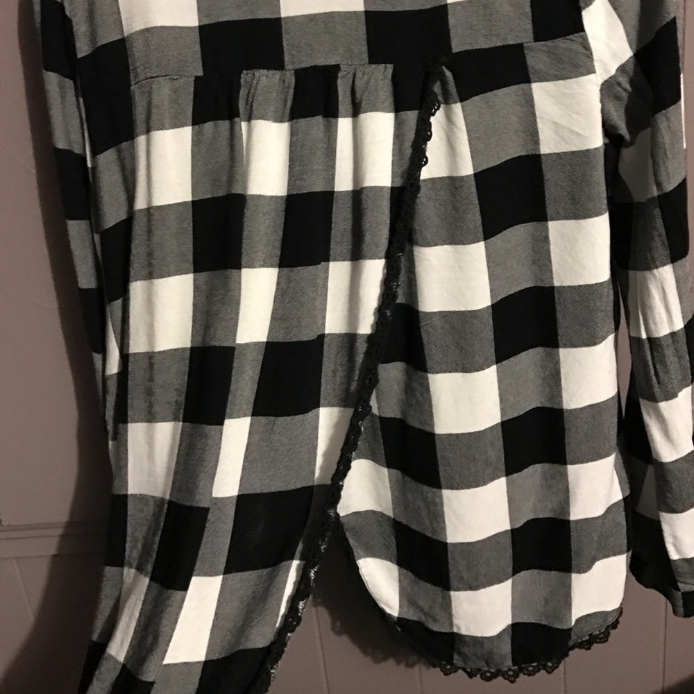 Sexy flannel, opens in the back to show some back