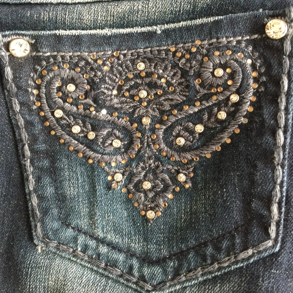 Embroidered jeweled distressed jeans
