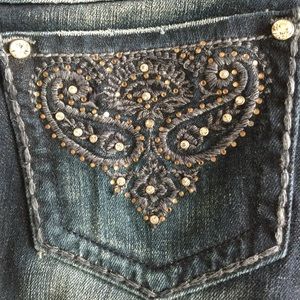Embroidered jeweled distressed jeans