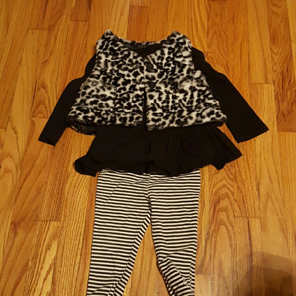 Calvin Klein outfit with leopard print vest
