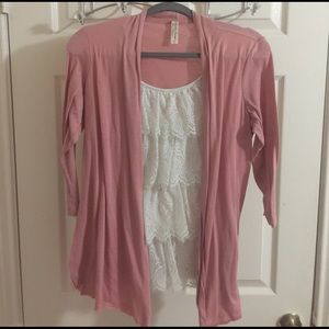 White ruffled top with attached blush cardigan.