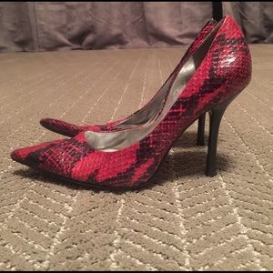 Red and black snake print heels.