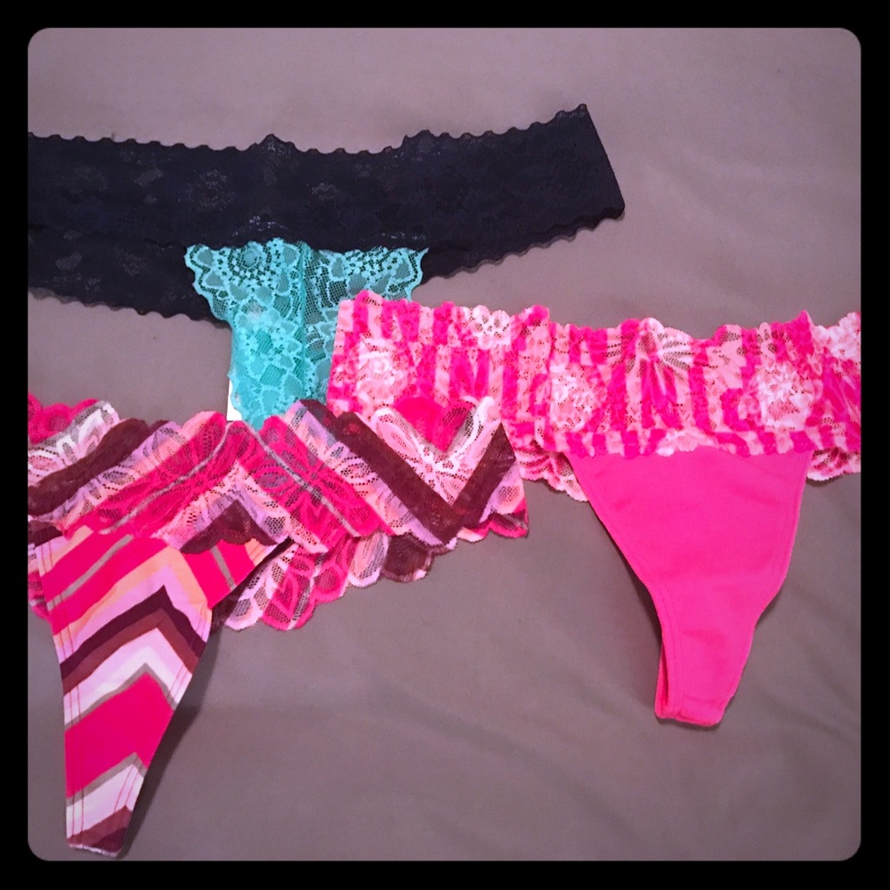 3 Victoria Secret Thongs with floral lace Band.