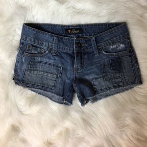 GUESS light wash denim shorts with patchwork