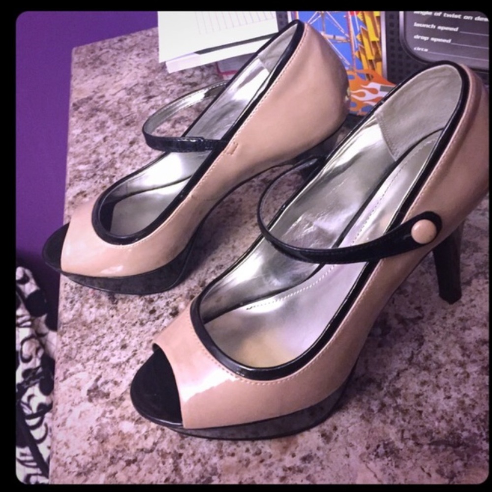 Nude and black peep toe platform heels