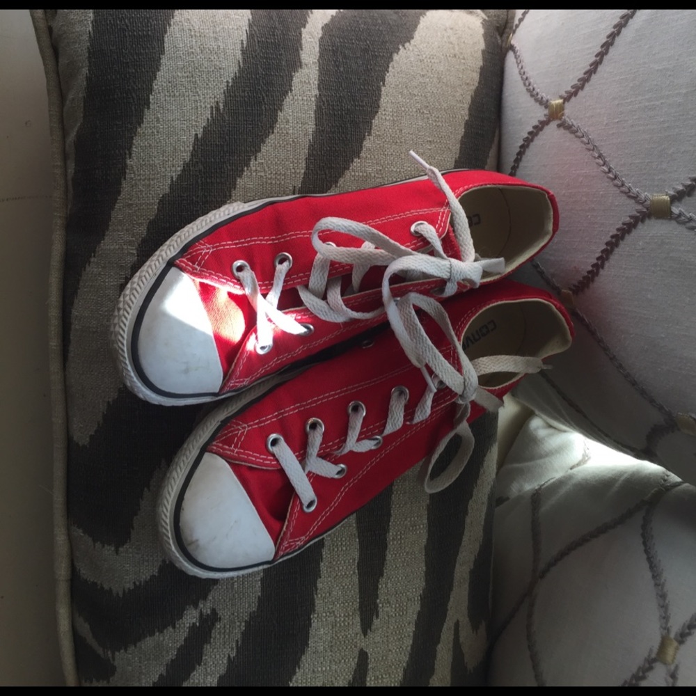 Girls red Converse tennis shoes