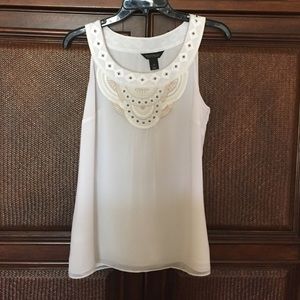 Beautiful white sleeveless blouse, never worn