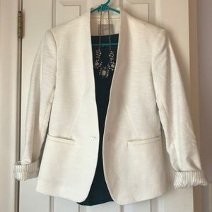 White collarless textured blazer