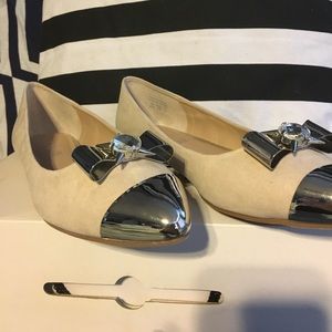 Steel toe flats with a beautiful bow on top