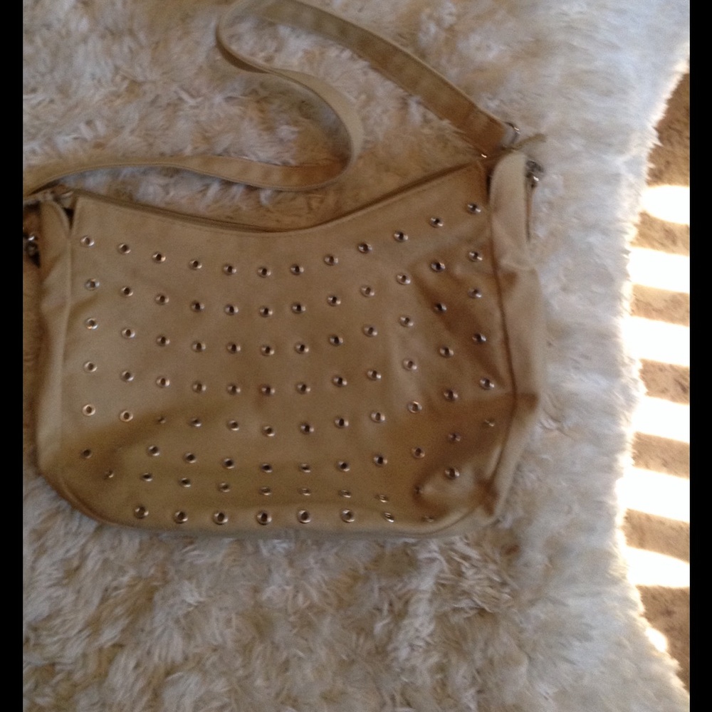 Tan canvas/silver grommet purse
