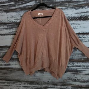 Simple sweater with small slits on sides