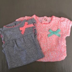 Two newborn baby girl onesies