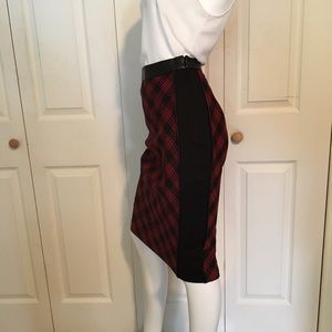 The limited plaid knit skirt with faux leather