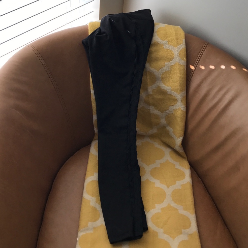 Used leggings with braided detail