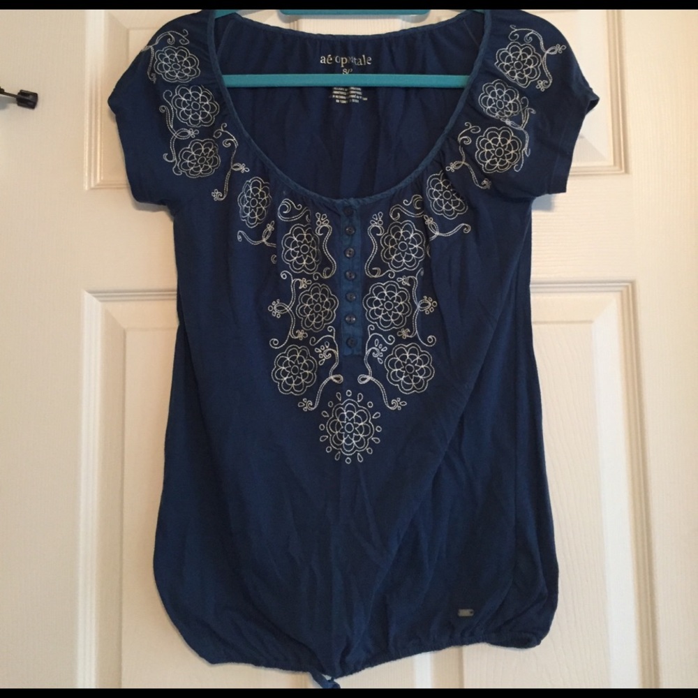 Blue top w/ white embroidery