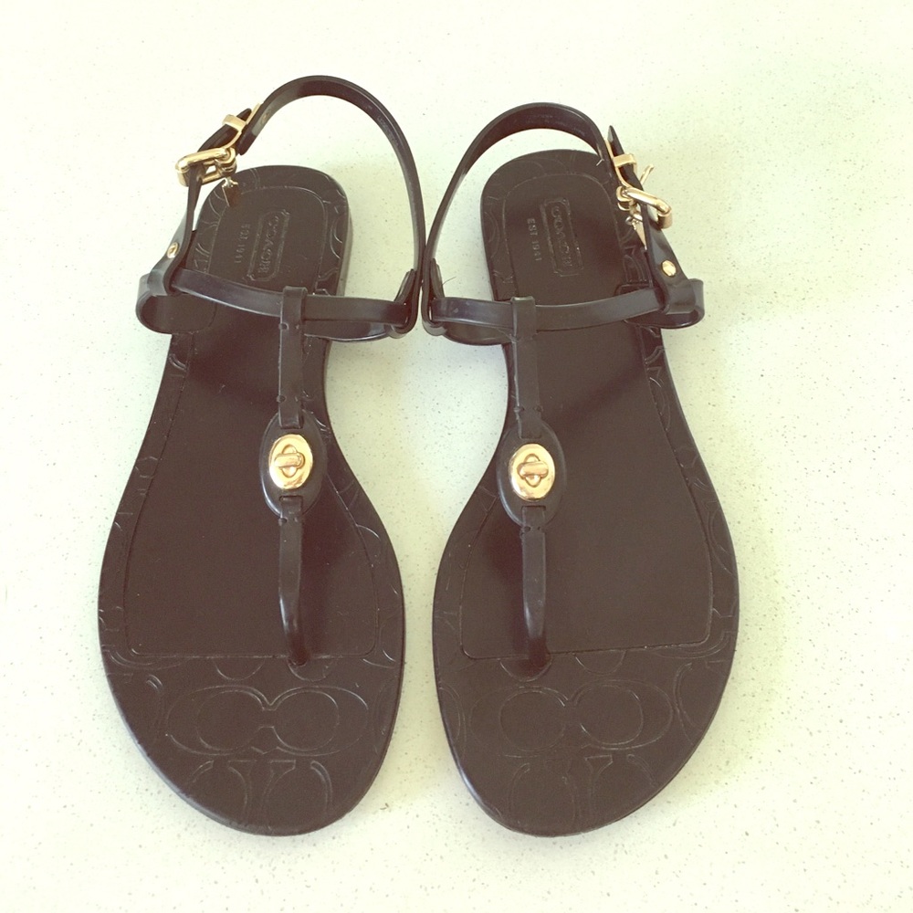 Black Coach sandal with gold hardware!