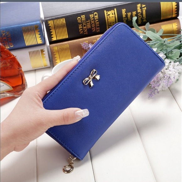 hsohailk Handbags - CLOSET CLOSING Beautiful leather wallet
