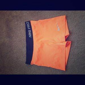 Nike pro - Bright orange w/ grey band Sz S