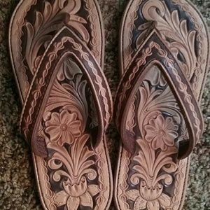 Tooled leather flip flops