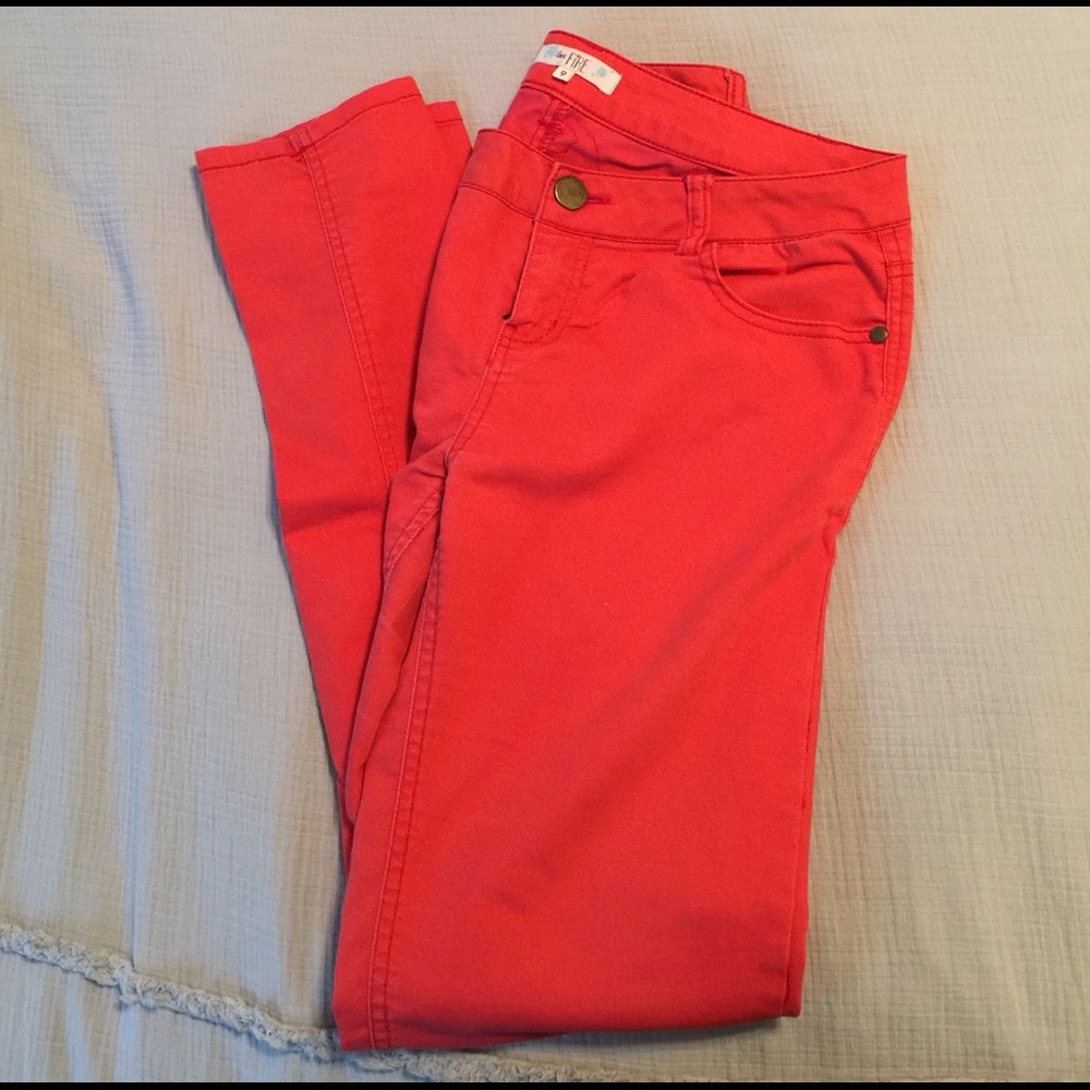 Orange skinny jeans