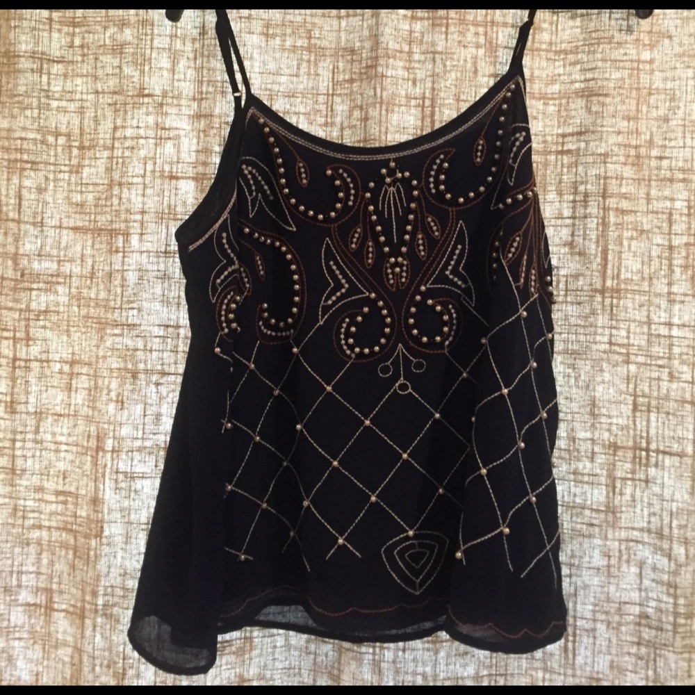 Embellished tank