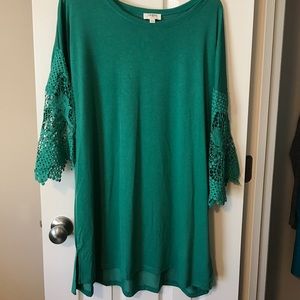Emerald green tunic with lace sleeves