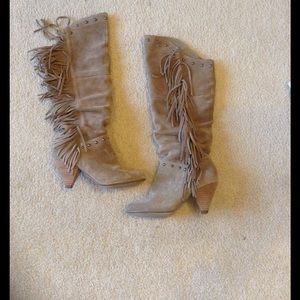 Report heeled boots.