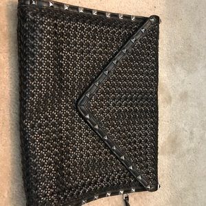 Oversized black envelope clutch