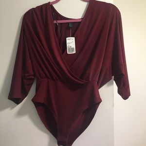 Red crossover body suit