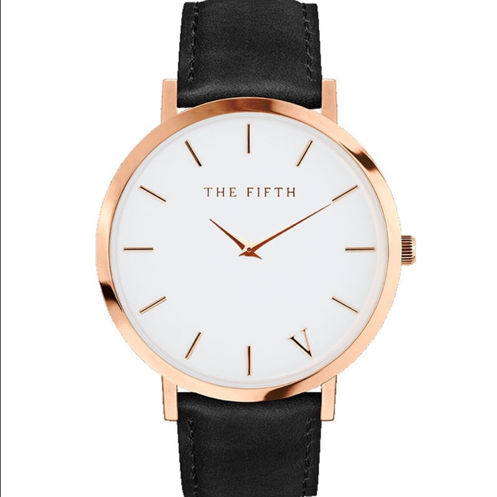 The fifth black and gold watch with white face