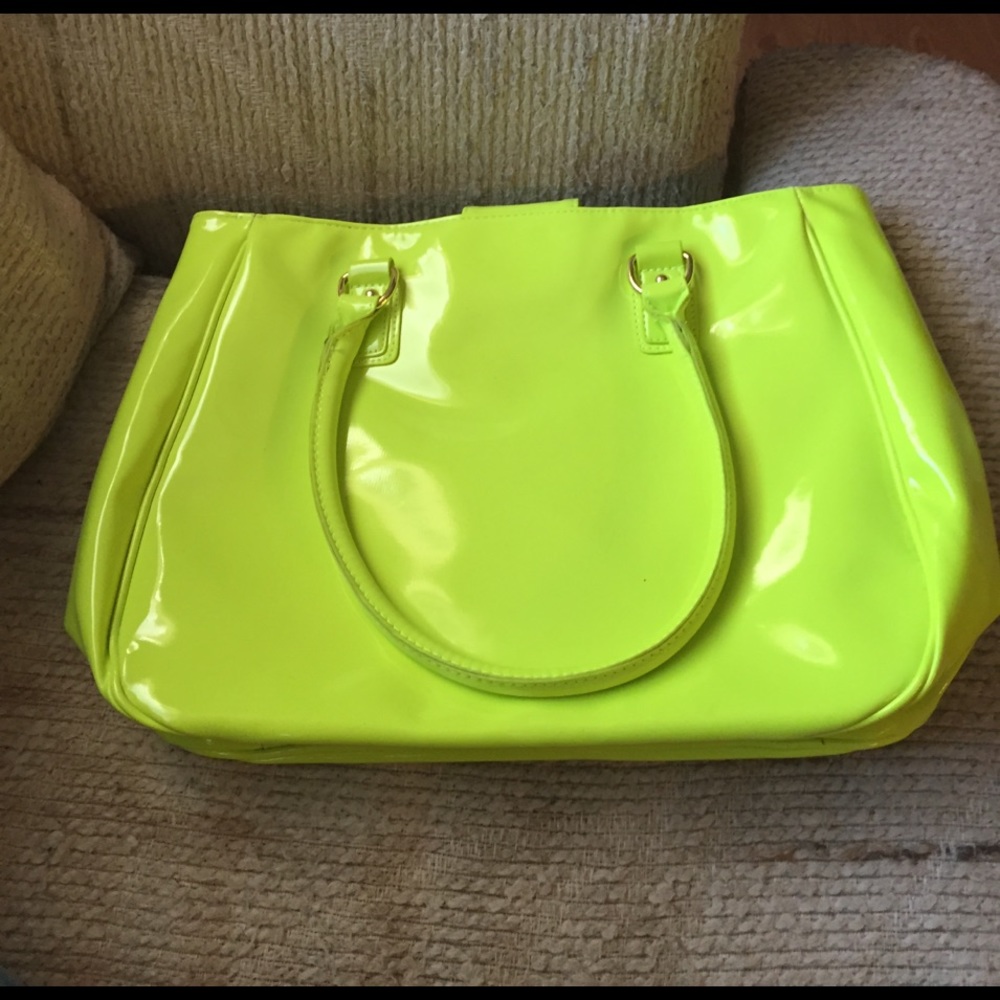 Neon yellow purse with clean blue interior