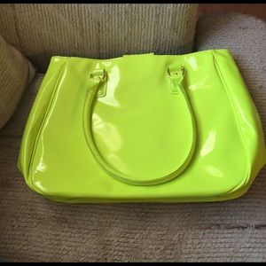 Neon yellow purse with clean blue interior