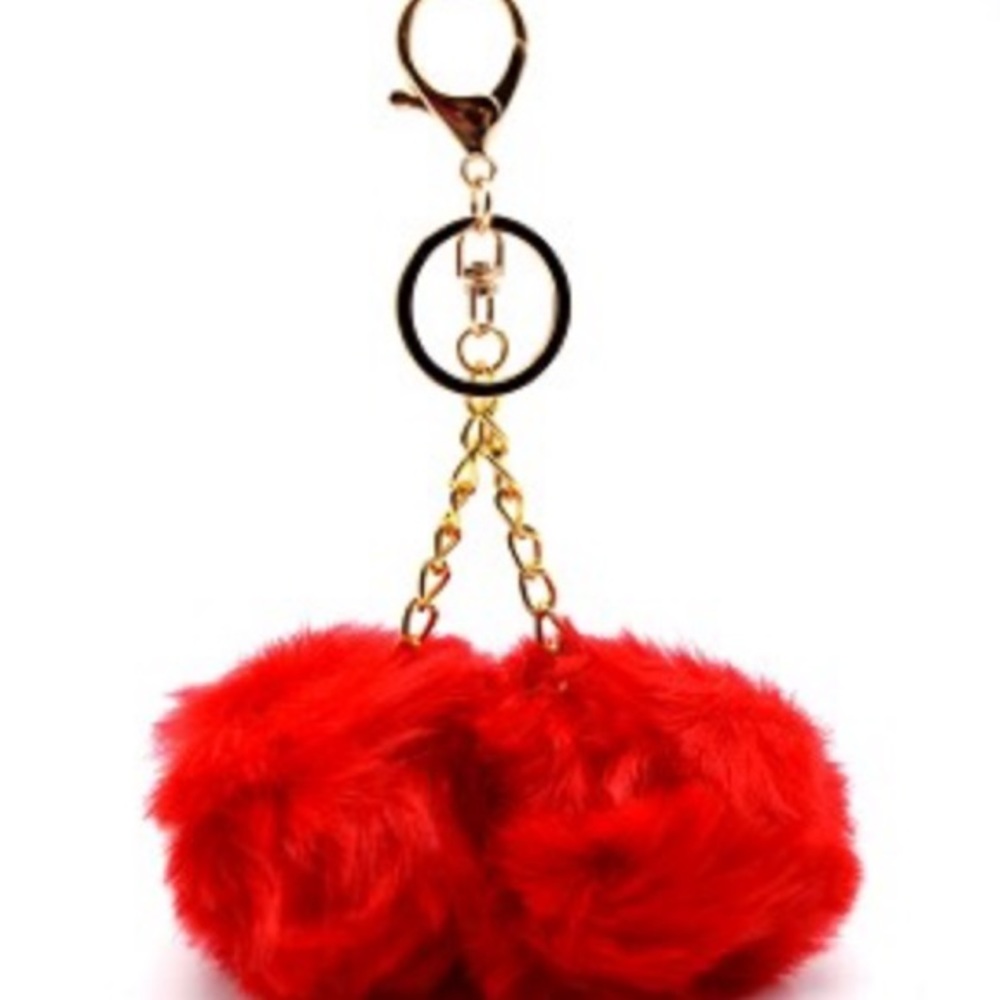 Pom poms! New with tag. Assorted colors available.