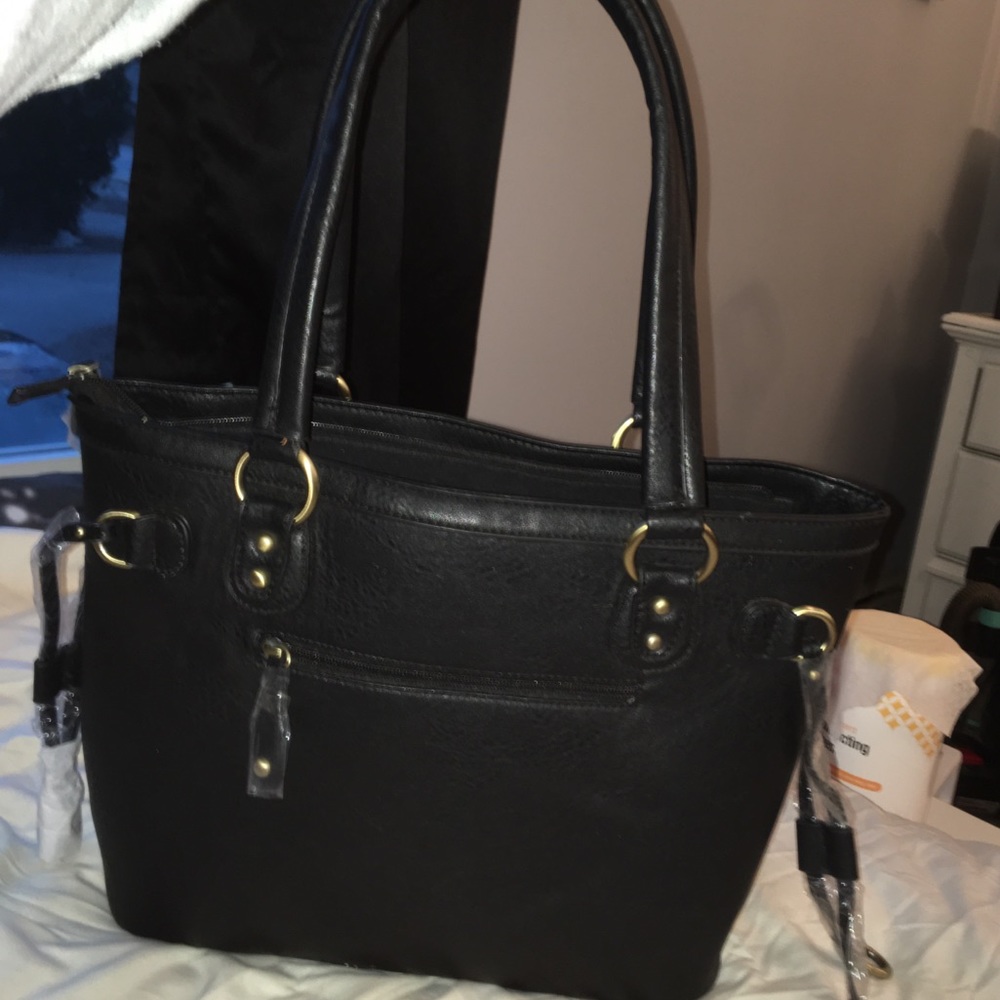 Black Leather purse, brand new and never used!