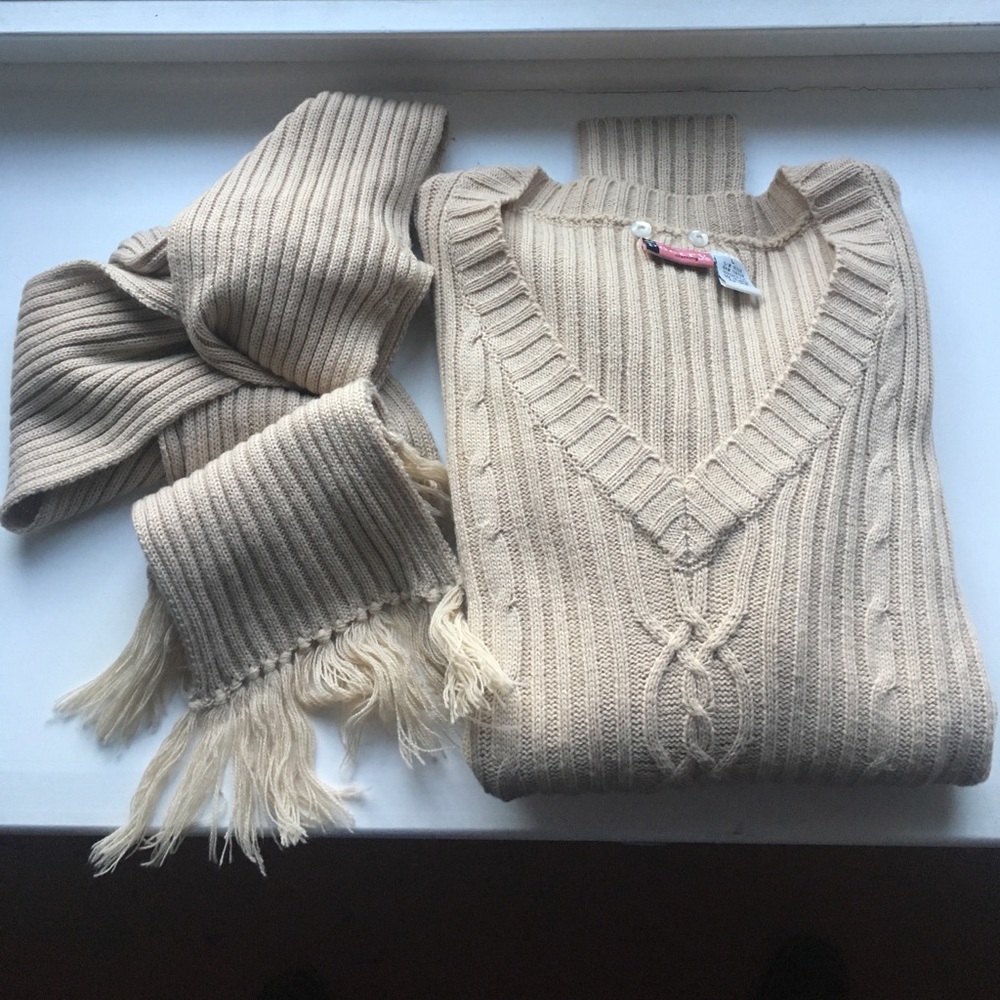 Sweater with matching scarf. Cute for spring.