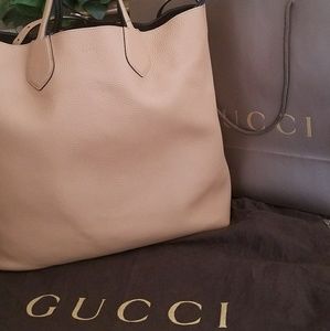 Gucci reversible leather bag
