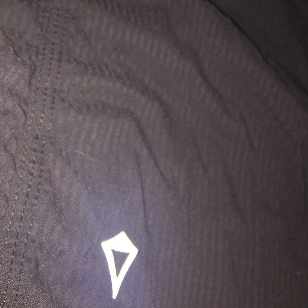 Lined black Ivivva pants.