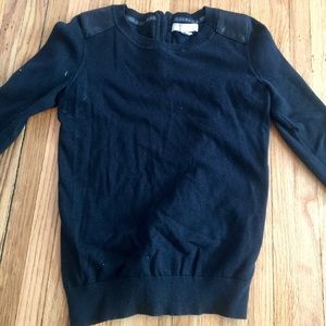 Black sweater with leather caps