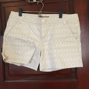 White and gold patterned shorts