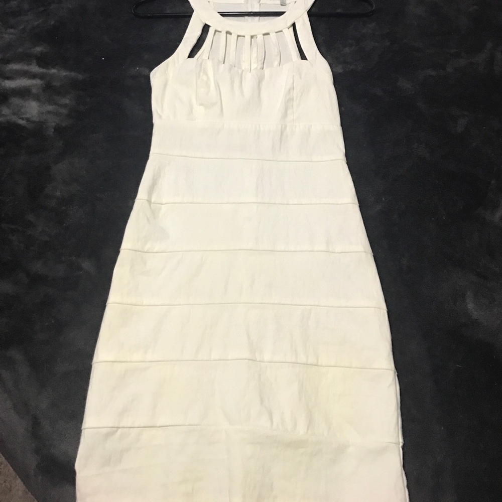 White Mini Dress With Cut Out Neckline.