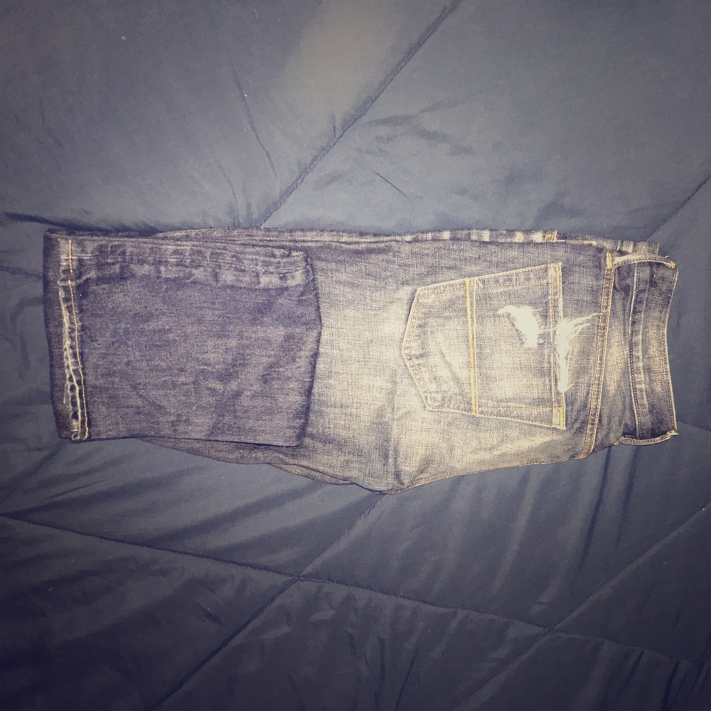 Abercrombie and fitch ripped jeans.