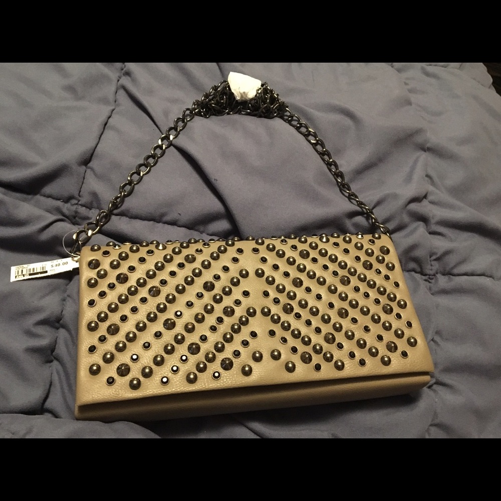 Tan studded clutch