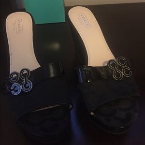 Coach wedge slides. Size 8. Excellent condition.