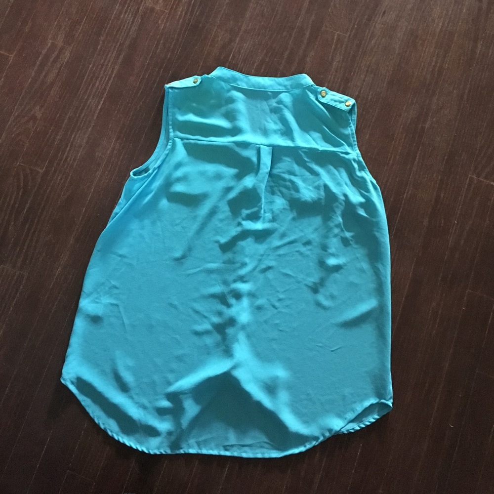 Bright/light blue sleeveless blouse