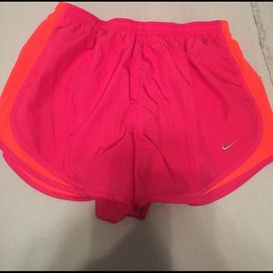 Nike magenta workout shorts