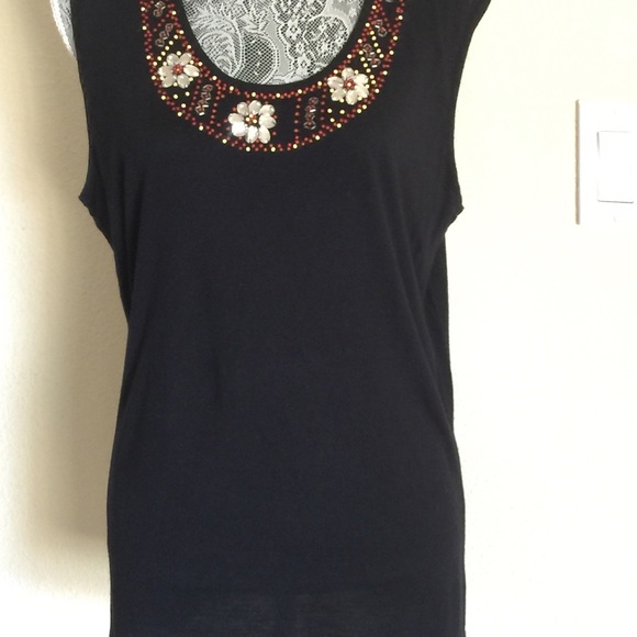 Black top.Embellished with rhinestones and beads. - Picture 1 of 2